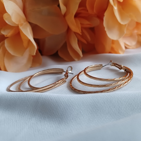 Golden Spiral Hoop Earrings - Picture 13 of 15